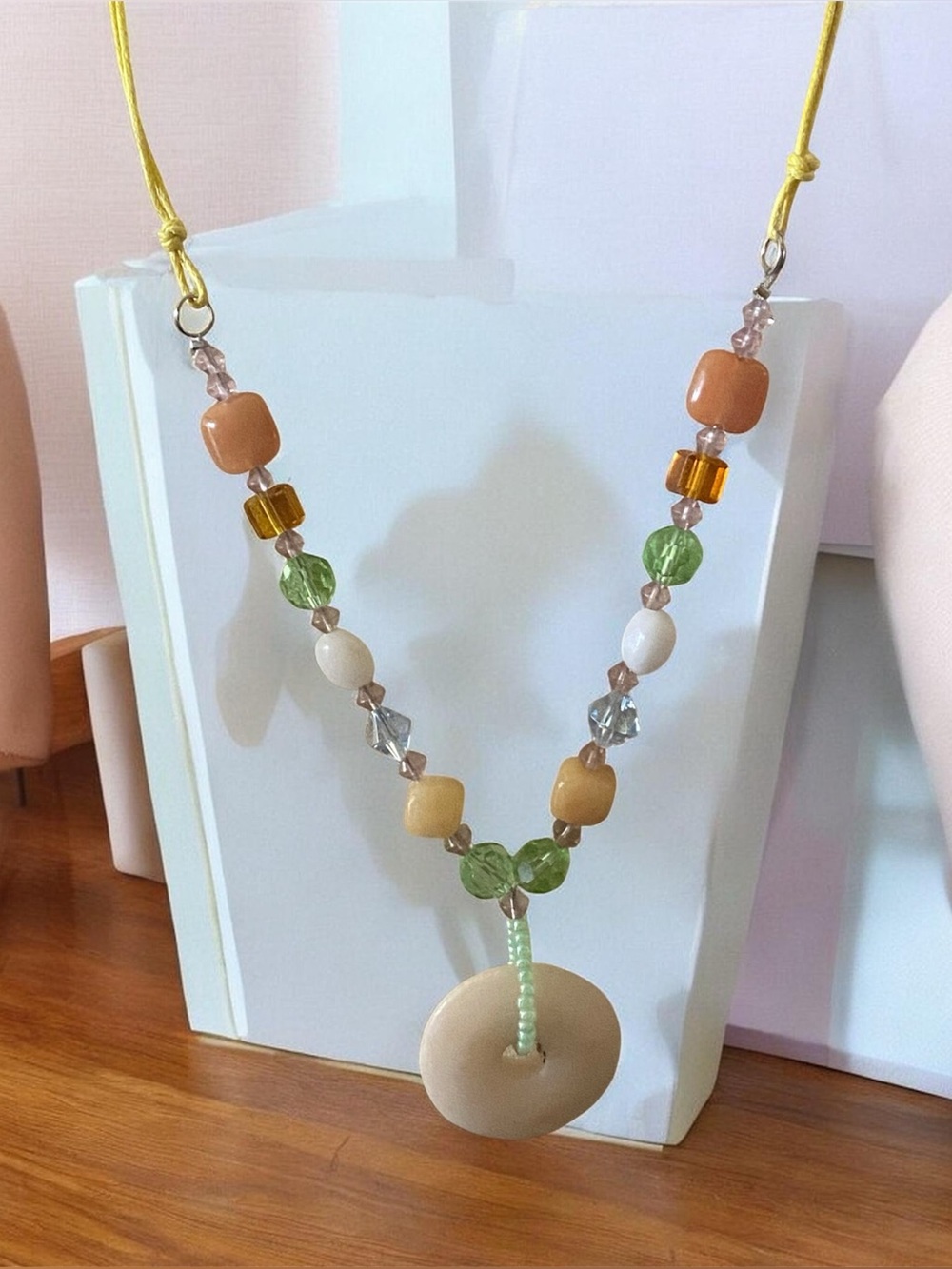 Crystal Beaded Necklace with Carved Shell Disc Accent